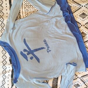 Kim & Cami Light Blue Long Sleeve Top with Peace Symbol